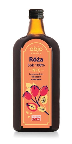 Szklana butelka soku  z róży, 100% NFC, tłoczony bezpośrednio z owoców. Etykieta w odcieniach pomarańczy z ilustracją owocu i znakiem "Produkt Polski".