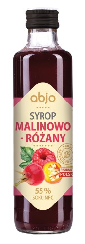 Butelka syropu malinowo -różanego  marki Abjo, zawierającego 55% soku NFC. Na etykiecie widoczne ilustracje owoców malin i róży, oznaczenie "Produkt Polski" oraz informacja o naturalnym składzie.
